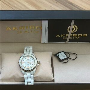 Akribos XXIV White Ceramic Watch with Rose Gold Accents